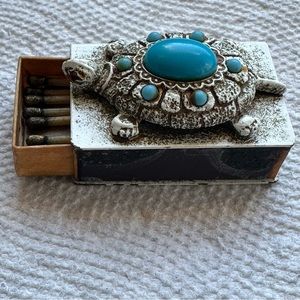 VINTAGE METAL MATCHBOX TURTLE DESIGNED WITH TURQUOISE & RUBY RED STONES FOR EYES